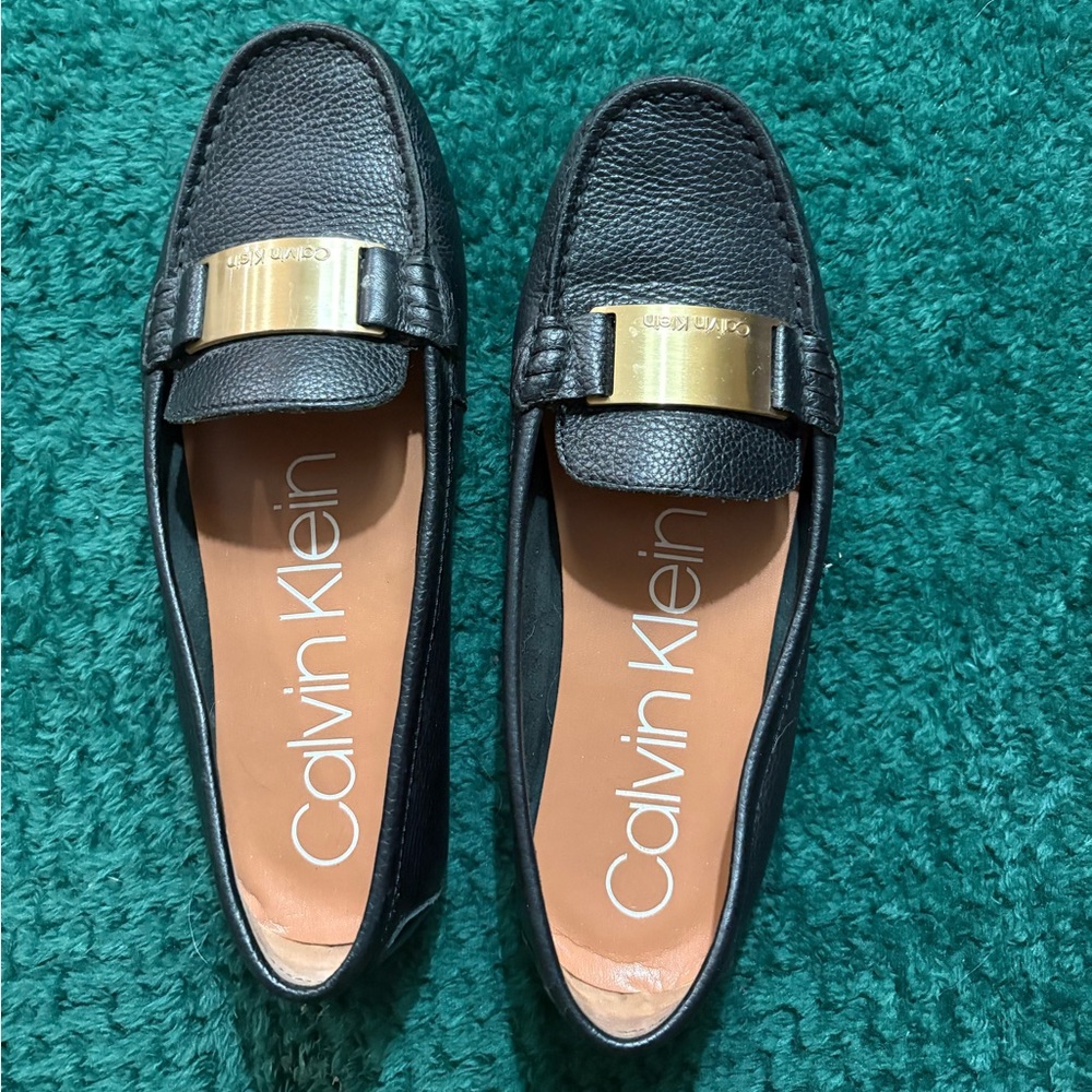 Calvin Klein Black Leather Loafers with Gold Accent
